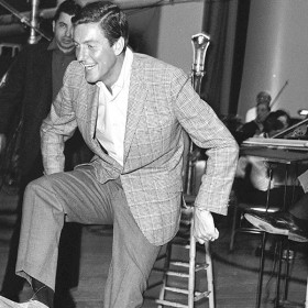 photo of Dick Van Dyke dancing on the set of Mary Poppins