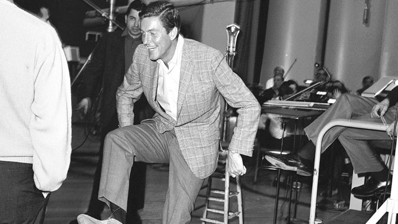 photo of Dick Van Dyke dancing on the set of Mary Poppins