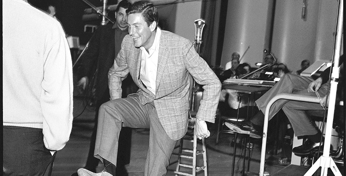photo of Dick Van Dyke dancing on the set of Mary Poppins