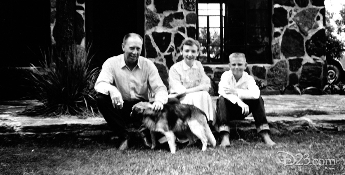 photo of a young Fess Parker seated on the front stoop with his family