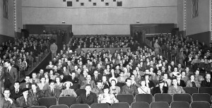 People sitting in the Disney Studios theater.