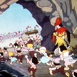 cel from Silly Symphony cartoon The Pied Piper showing children being led through an opening in a rock wall out to Happylane where candy canes are everywhere