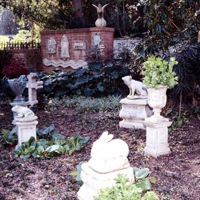 photo of gravemarkers with pet names and figures of dogs, cats, rabbits and animals