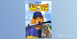 poster for Air Bud Seventh Inning Fetch showing dog with baseball bat gripped in its mouth beside a seated raccoon
