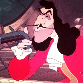 animation cel of Captain Hook seated holding a flintlock pistol