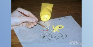 photo of animation cel being hand painted
