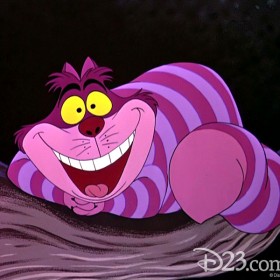 animation cel from Alice in Wonderland showing Cheshire Cat curled up smiling