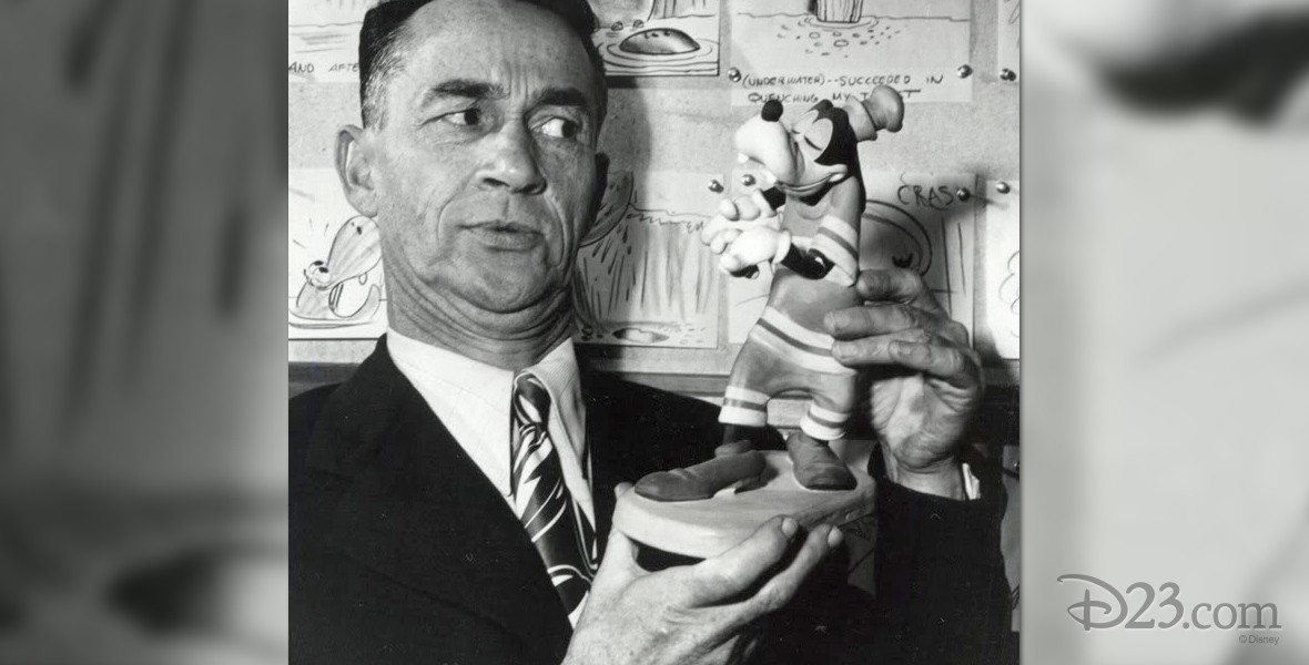 photo of Pinto Colvig holding a Goofy figurine
