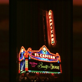 nighttime photo of El Capitan movie theater in Hollywood