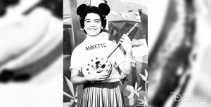 photo of young Annette Funicello wearing Mouseketeer cap and holding a banjo