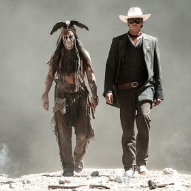 movie still of the Lone Ranger and Tonto walking side-by-side in The Lone Ranger