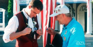 Photo of two men pin trading at Disneyland