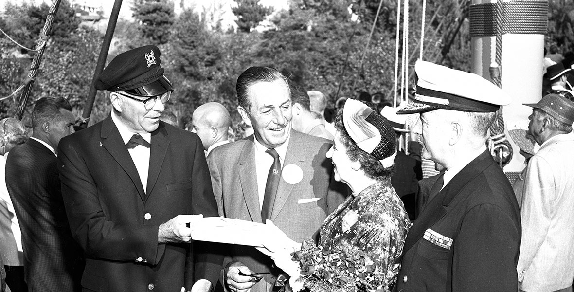 Fowler (left) and Disney welcome Disneyland guests aboard the Sailing Ship Columbia on the Rivers of America (Disney)