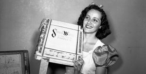 Adriana Caselotti holding Snow White book