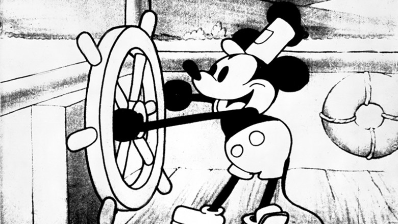 cel from original cartoon Steamboat Willie showing early Mickey Mouse at the wheel of his ship