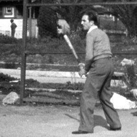 Walt Disney playing baseball