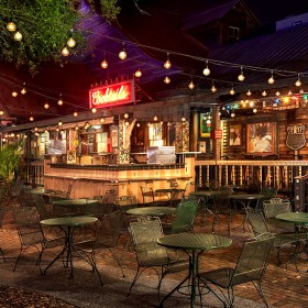 nighttime photo of outdoor patio adjoining House of Blues restaurant