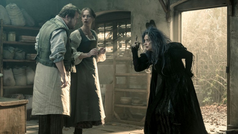 scene from feature Into the Woods with Meryl Streep as the witch, Emily Blunt as the Baker's Wife, and James Corden as the Baker