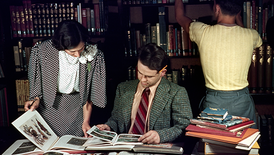 Animator Ward Kimball (center) is pictured at the Studio Library