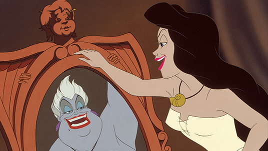 still from animated feature The Little Mermaid featuring Ursula reflected in a mirror