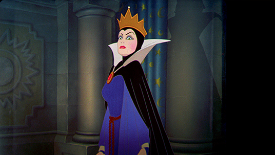 cel from the animated feature Snow White and the Seven Dwarfs featuring the Evil Queen wearing tiara and staring menacingly