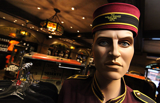 photo of interior of Disney California Adventure's Twilight Zone Tower of Terror attraction featuring The Hollywood Tower Hotel bell boy full-size figure