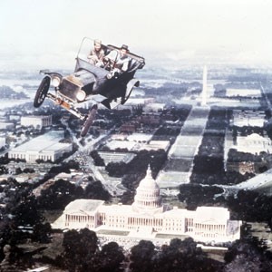 special effects shot showing Fred MacMurray as Ned Brainard flying his jalopy over Washington D.C. Capitol building