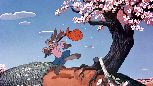 illustration of happily hopping smiling rabbit passing a cherry tree with a hobo's kerchief tied to a walking stick slung over his shoulder