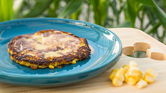 Savor the flavors of food made fresh from locally grown ingredients at one of 11 Festival outdoor kitchens—including a delectable sweet corn pancake from Venezuela.