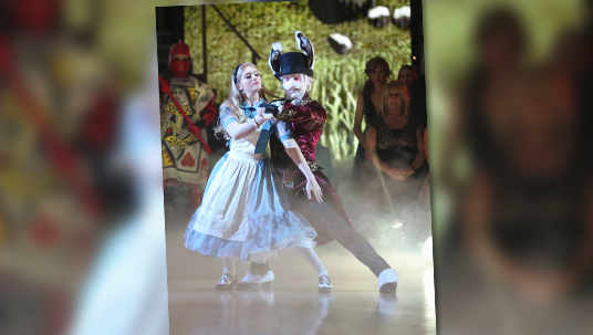 photo of Willow Shields and Mark Ballas dancing together on stage