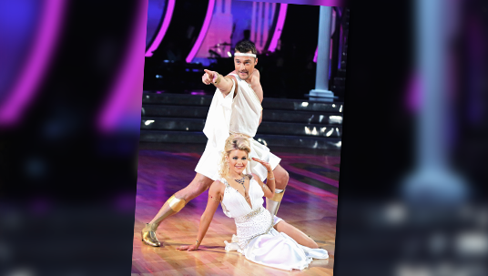 photo of Chris Soules and Witney Carson dancing together on stage