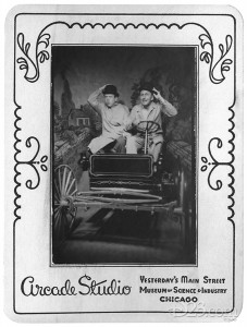 staged portrait of Walt Disney and Ward Kimball posing in a mocked-up old time jalopy during their visit to the1948 Chicago's Museum of Science and Industry