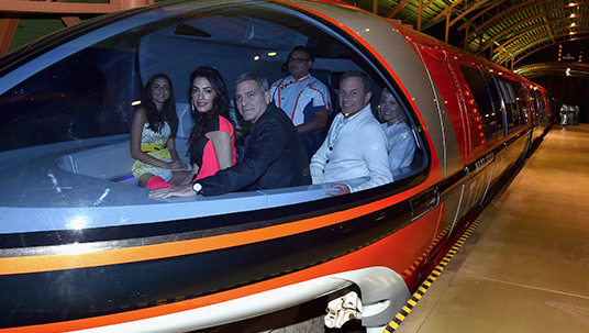 After the movie, George Clooney, his wife, Amal, and their niece Mia joined The Walt Disney Company Chairman and CEO Bob Iger and his wife, Willow Bay, for a ride to the after party—on the <em>Monorail</em>!