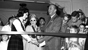 photo of Walt and Lillian Disney cutting dedication ribbon at Disneyland