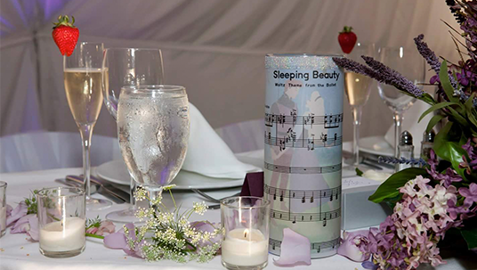 Disney Fan Wedding candles using the sheet music from Sleeping Beauty