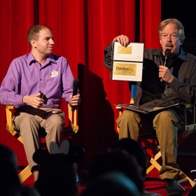 Disney Legend Tony Baxter showing a golden ticket from Disneyland U.S.A. Opening Day