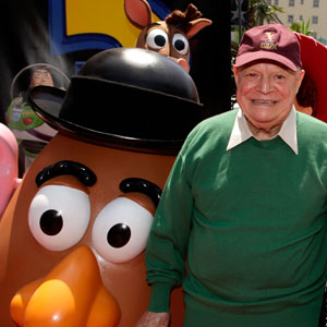 photo of Don Rickles posing with Mr. Potato Head