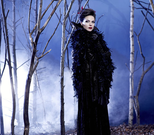 photo of actress Lana Parrilla in foggy forest of leafless birch trees