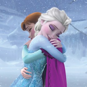 Image of Anna and Elsa hugging in Frozen