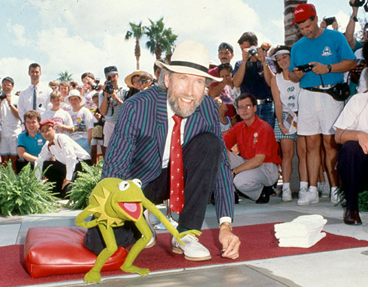 Jim Henson and Kermit the Frog on the red carpet
