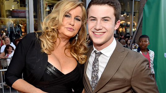 photo of actors Jennifer Coolidge and Dylan Minnette posing on the red carpet