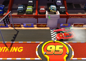 video capture frame of Disney Interactive game Cars Fast as Lightning showing cars at starting line while other cars occupy raceway stands