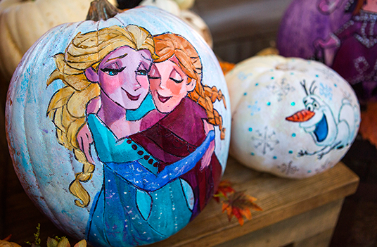 photo of pumpkins painted with imagery from the animated feature Frozen