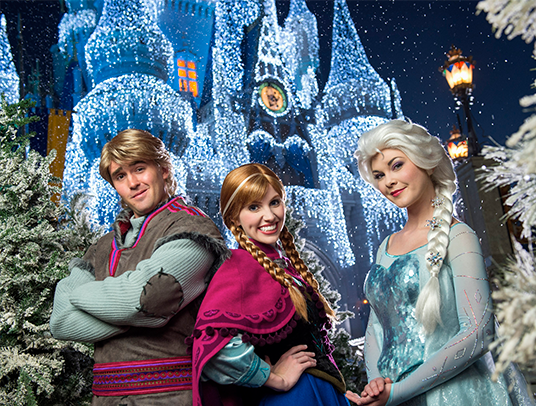 Frozen's Queen Elsa "lets it go" and transforms Cinderella Castle into a glistening ice palace for the holidays