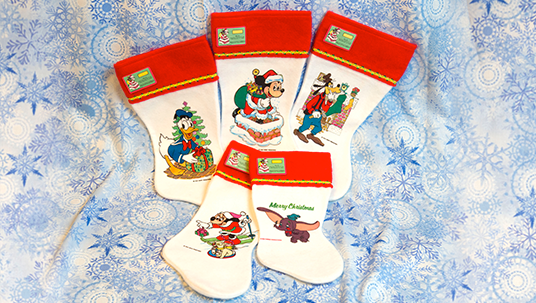 Set of Christmas stockings, including Mickey, Minnie, Donald, Goofy, and Dumbo