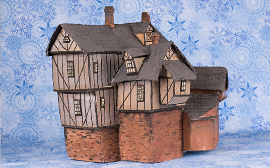 Miniature model of a Muppet Christmas Carol village house