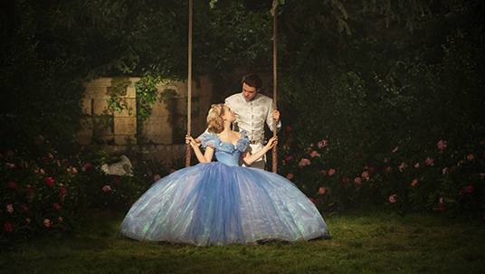 production still from the movie Cinderella featuring actors Lily James & Richard Madden