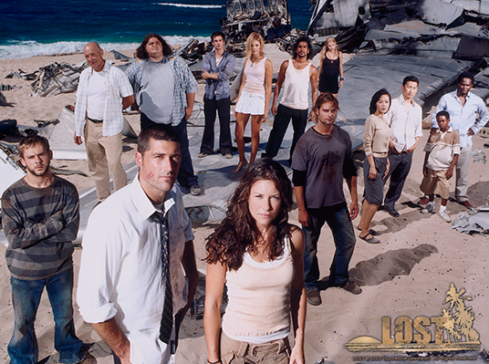 cast of TV series Lost standing on a beach amid wreckage of their down aircraft