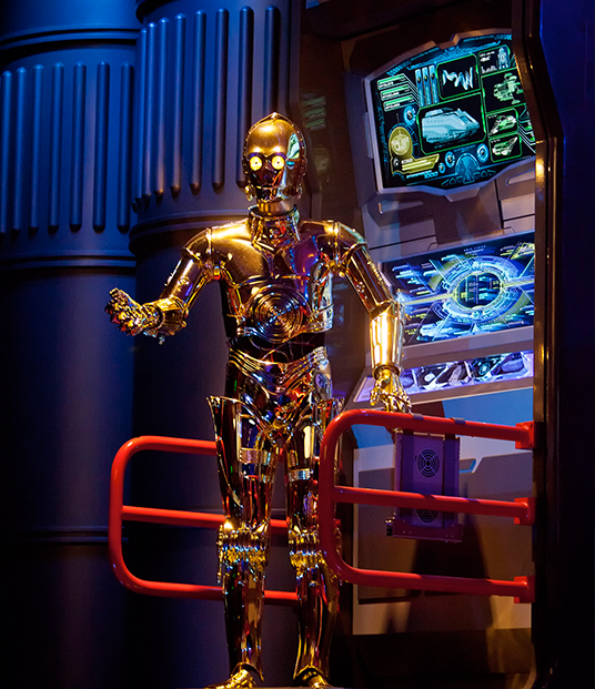 photo of Audio-Animatron version of C-3PO android speaking from electronic console