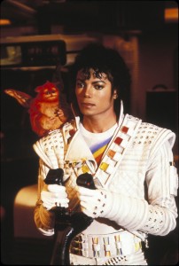 photo of Michael Jackson in costume as Captain EO with small pet monkey on one shoulder